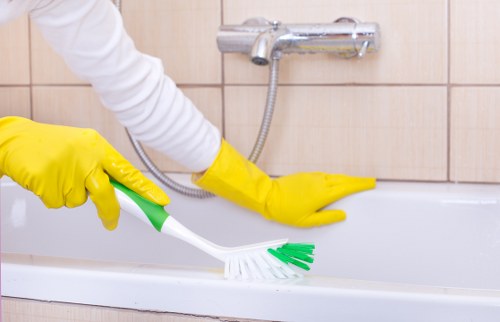 Cleaner handling waste responsibly during a carpet cleaning service